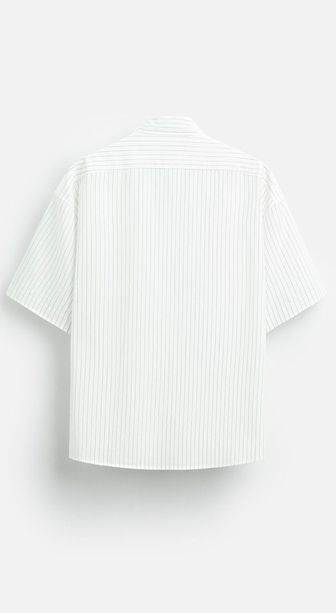 Striped shirt with printed sticker