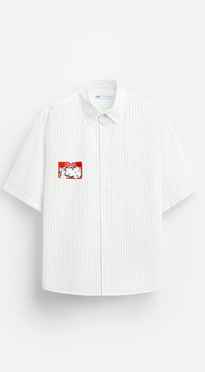 Striped shirt with printed sticker